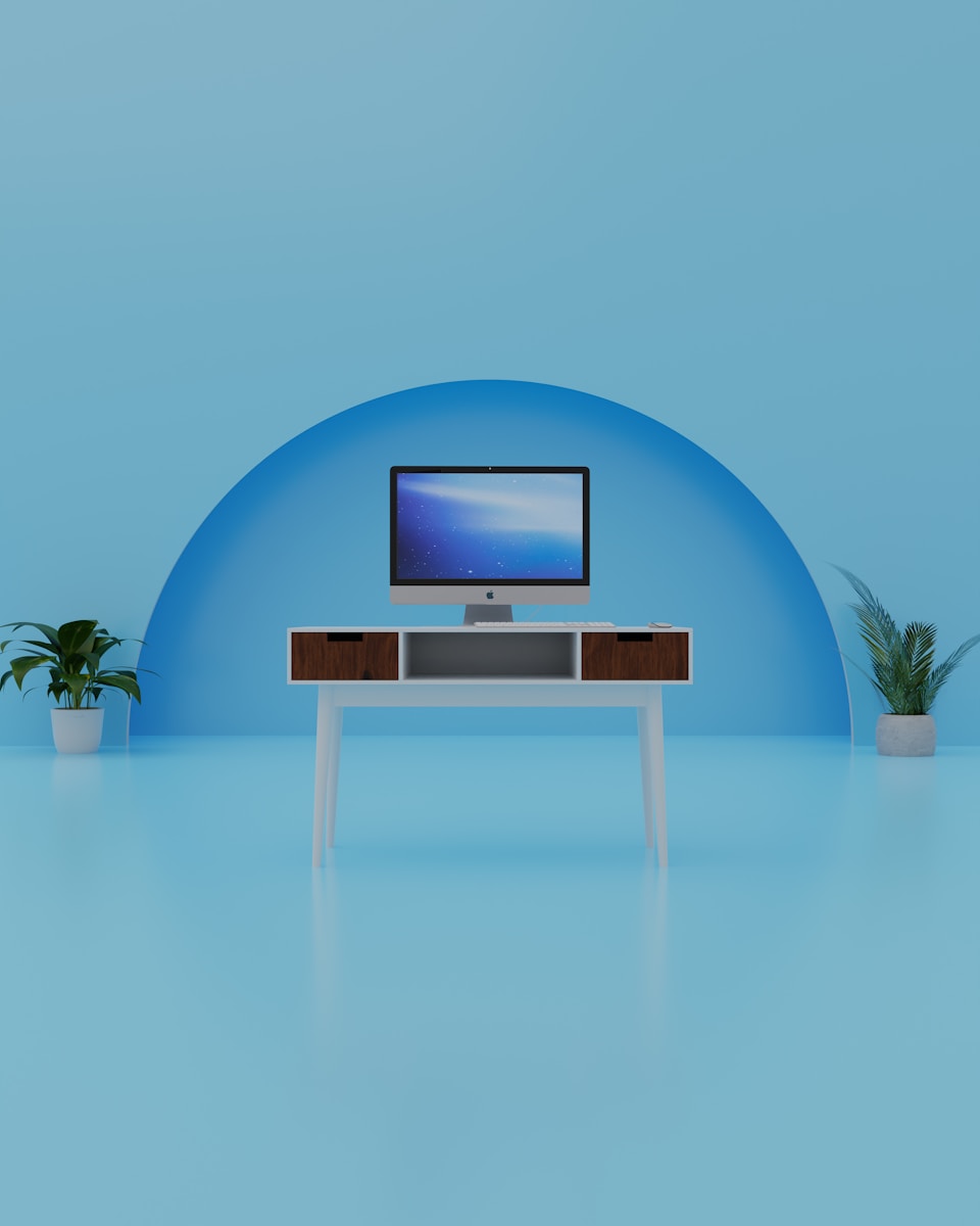 Contemporary office lobby with a prominent screen.