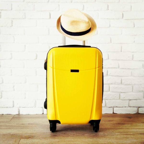 Yellow travel suit case