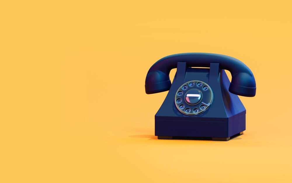 Photo black retro phone on a yellow background. 3d illustration