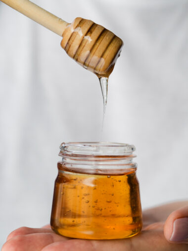 Honey dripping from dipper