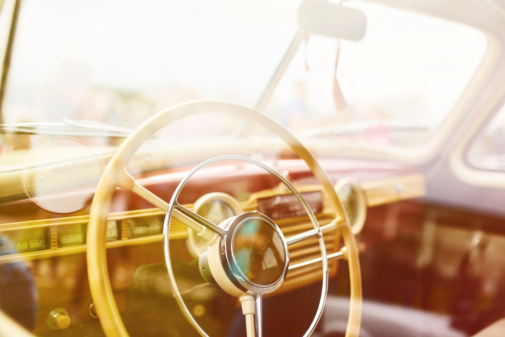 retro car parked on grass