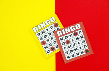 Yellow and red bingo boards or playing cards for winning chips classic us or canadian five to five bingo cards on bright background