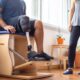 A Sitting Man Rehabilitating with a Prosthetic Leg